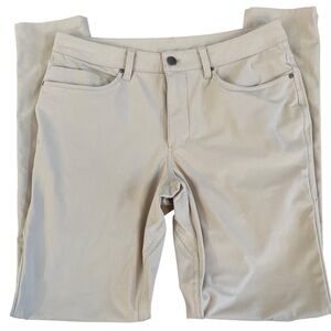 Lululemon ABC pants in a beige or khaki color size 31